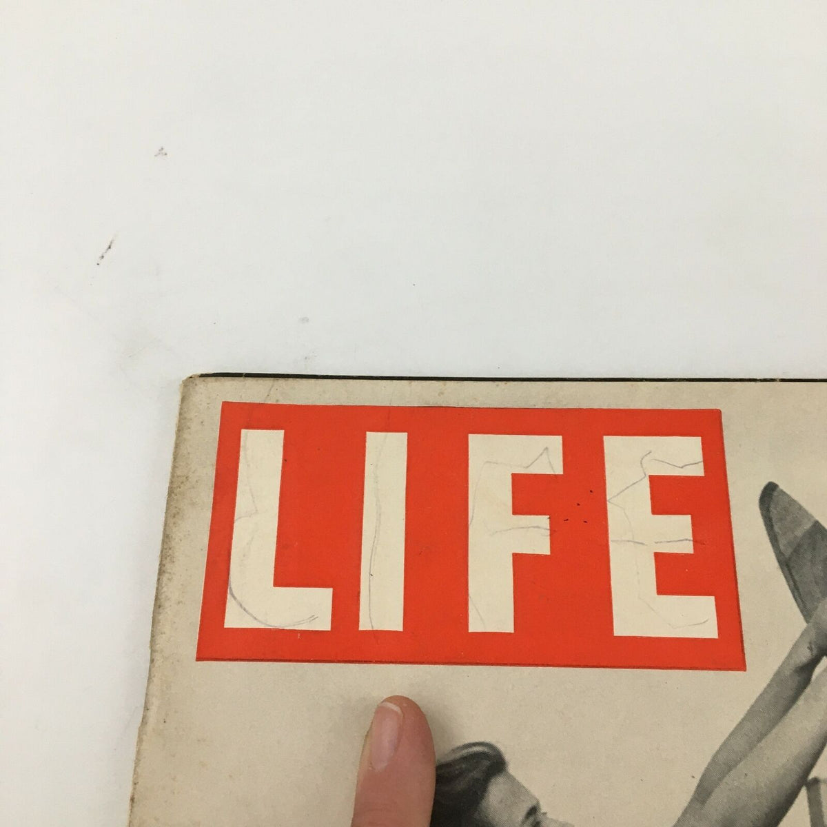 Detail of the VTG Life Magazine cover from September 16, 1940, focusing on the title 'LIFE' at the top of the magazine, indicating wear from age and use.