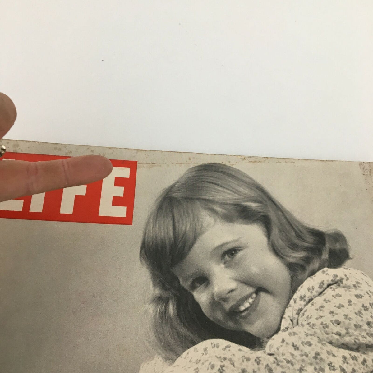 Close-up of the title section of the VTG Life Magazine December 19, 1949, highlighting the words 'Clothes for Little Girls'.