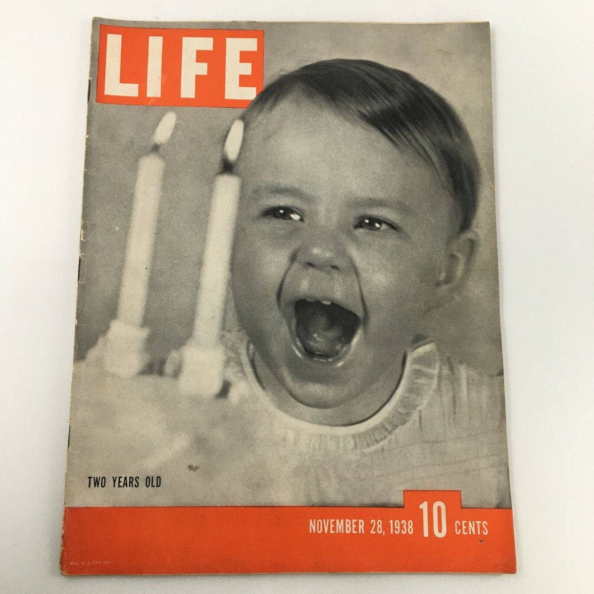 VTG Life Magazine November 28 1938 cover featuring a child celebrating a birthday with candles, showcasing vintage design and historical context.