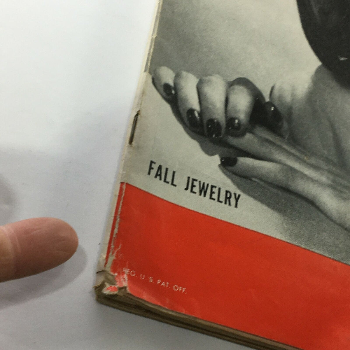 Close-up view of the cover of VTG Life Magazine October 15 1945, emphasizing the fall jewelry theme with elegant hand positioning, part of the vintage publication.