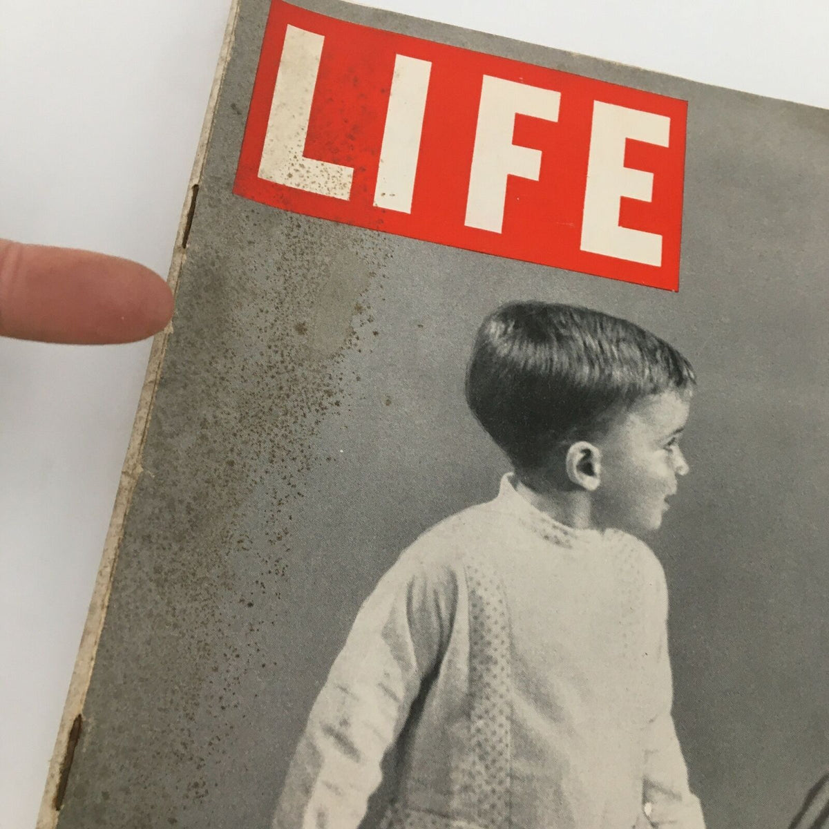 Close-up view of the cover of VTG Life Magazine February 28, 1949 showing some wear and the 'LIFE' logo.