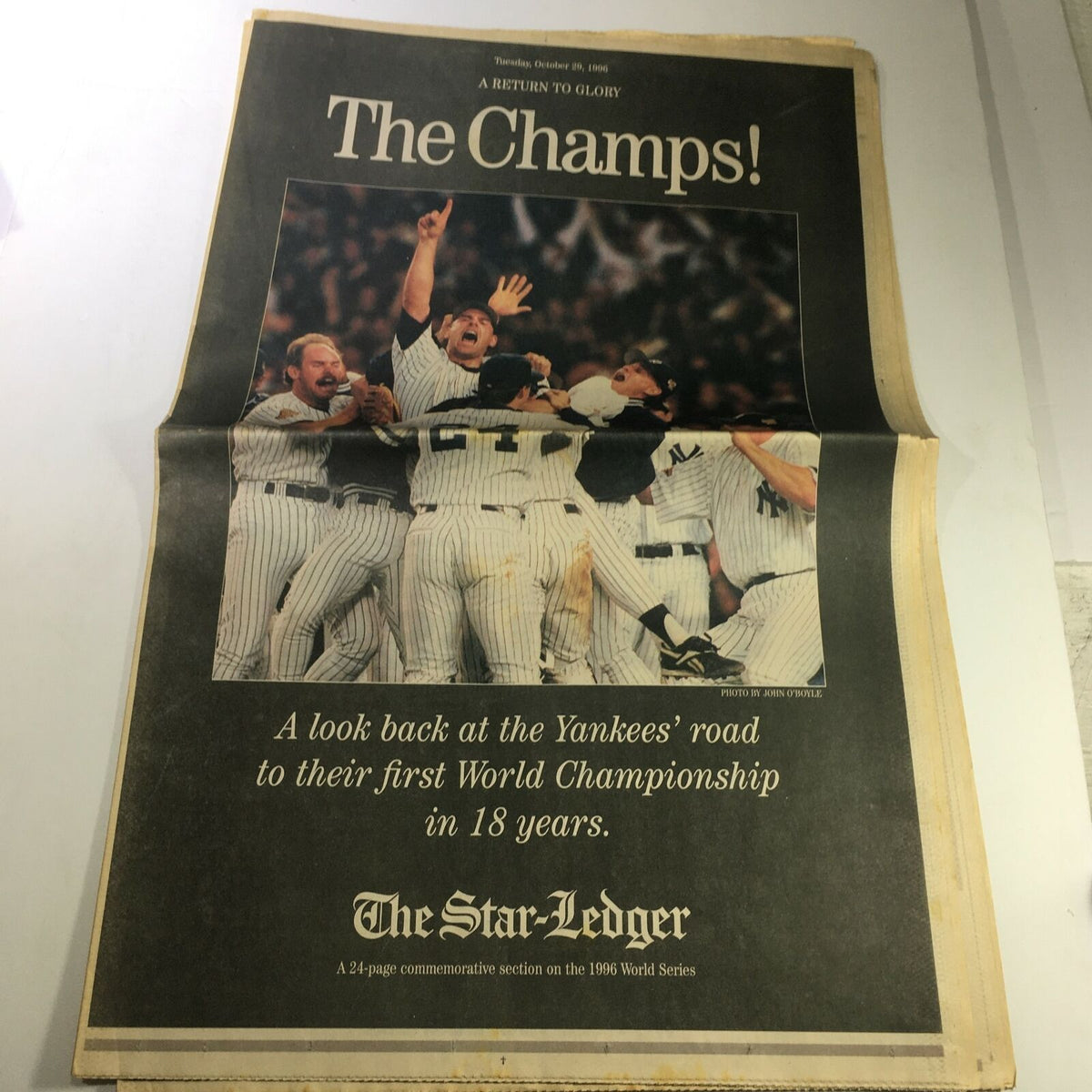 VTG The Star-Ledger Newspaper October 29 1996 - New York Yankees Champions featuring jubilant Yankees players celebrating their victory with excitement and joy.