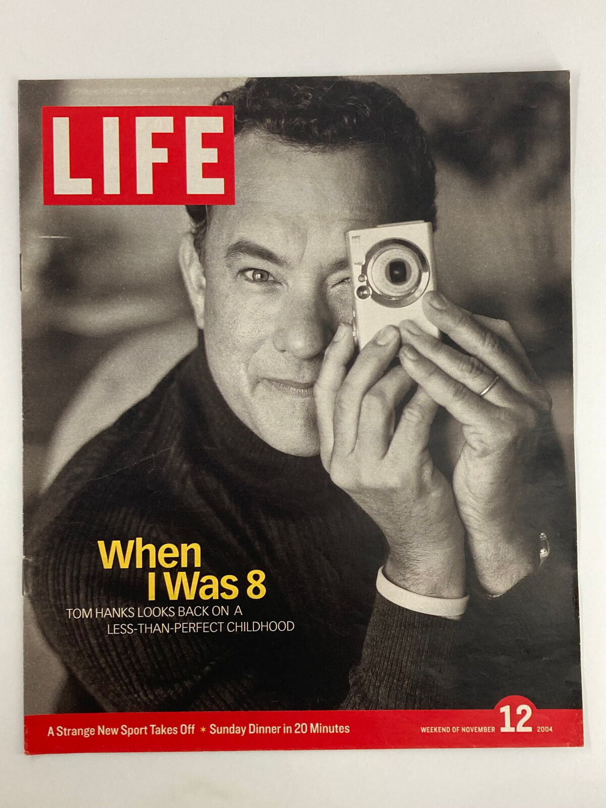 Life Magazine Newspaper Insert featuring Tom Hanks, November 12, 2004, showcasing a nostalgic look at the actor's childhood.