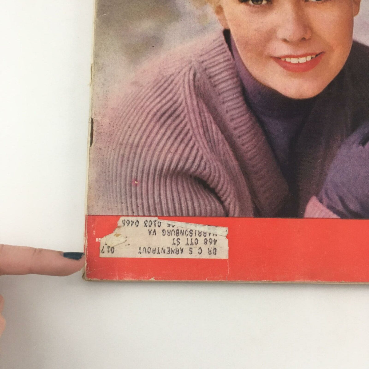 Detail of the bottom corner of the VTG Life Magazine, March 5, 1956, showing the cover price and a label sticker, featuring Kim Novak on the cover.