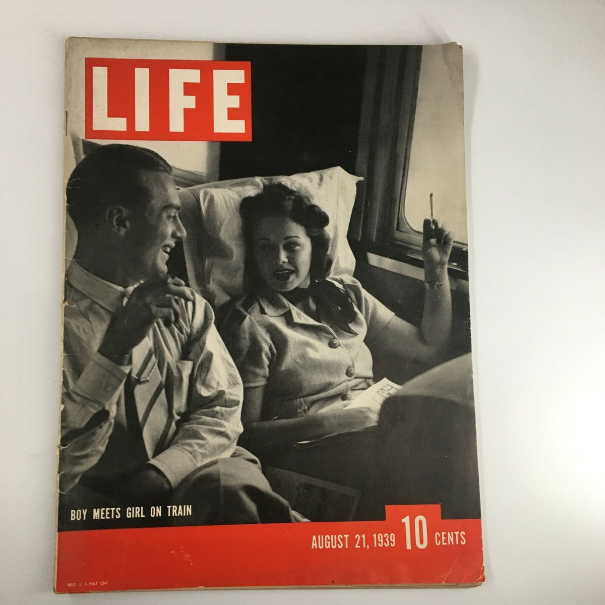 Cover of VTG Life Magazine from August 21, 1939 featuring the title 'Boy Meets Girl On Train', showcasing a photograph of a man and woman engaging in conversation on a train.