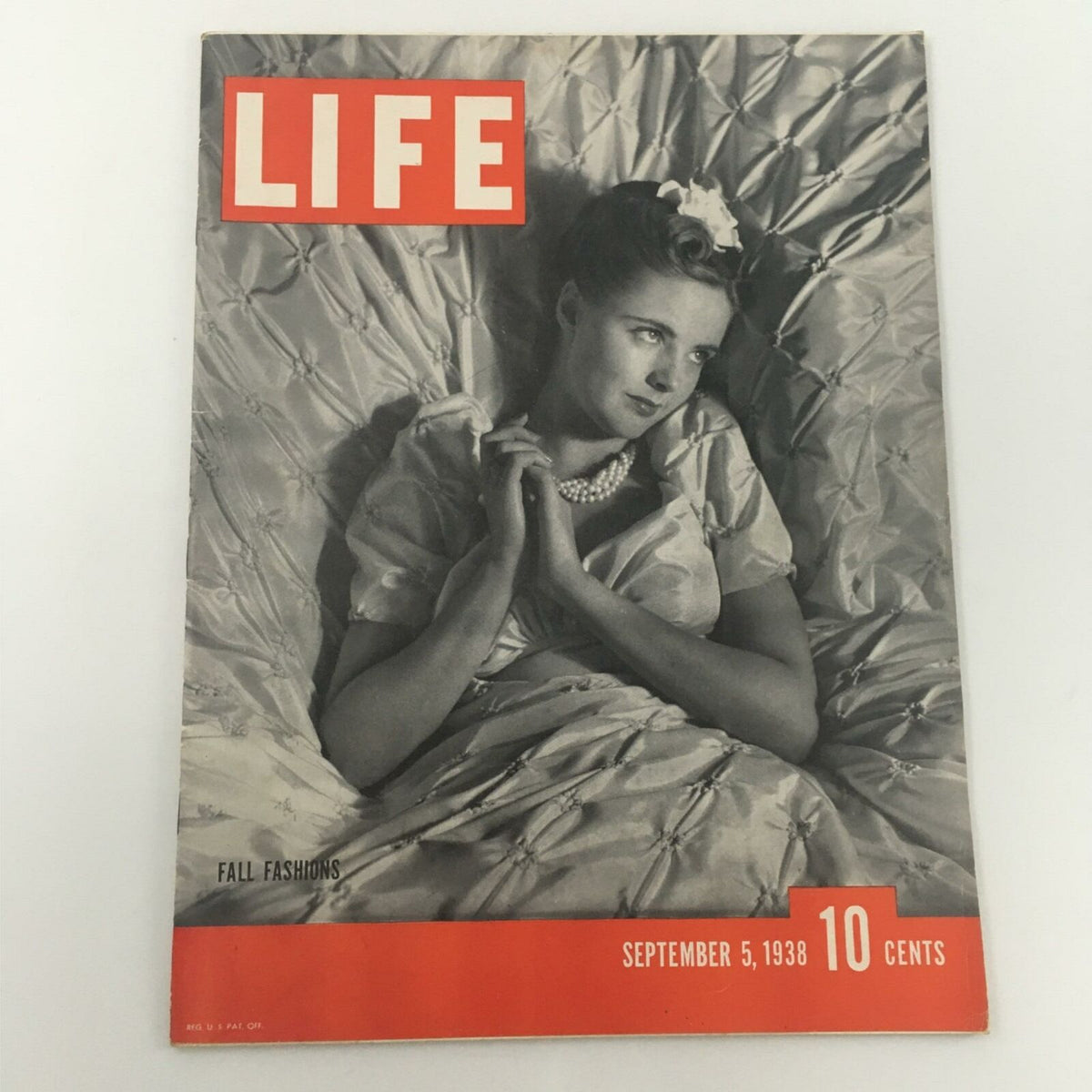 Cover of VTG Life Magazine September 5, 1938 featuring Katharine Aldridge Fall Fashions, showcasing a model dressed in elegant attire with pearls, against a textured background.
