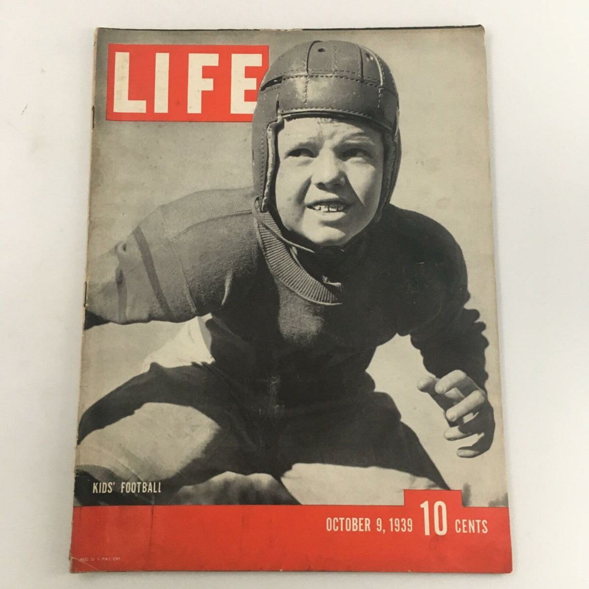 Vintage Life Magazine from October 9, 1939 featuring a young football player on the cover, showcasing kids' football and highlighting Bill Gregory.