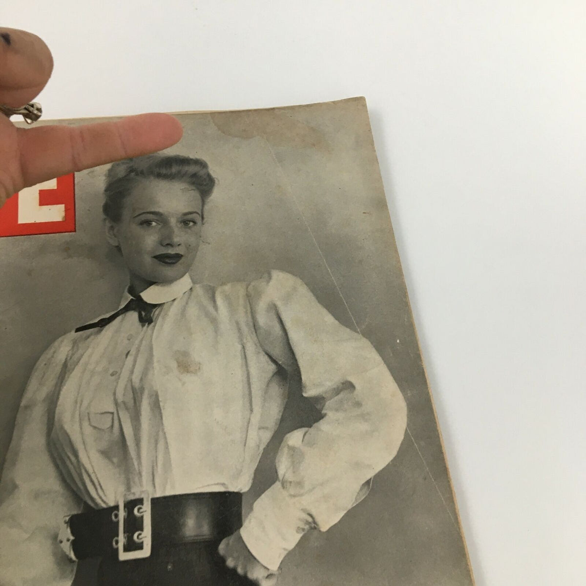 Detailed view of Vintage Life Magazine cover, November 19, 1945, spotlighting the 'Big Belts' fashion style, with clear model pose.
