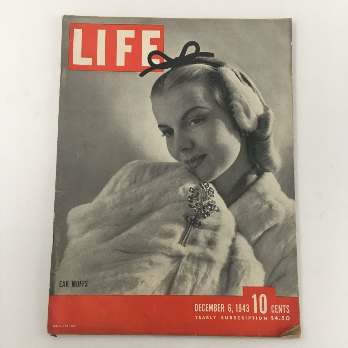 VTG Life Magazine December 6, 1943 featuring fashionable ear muffs on the cover, showcasing a vintage style portrait.