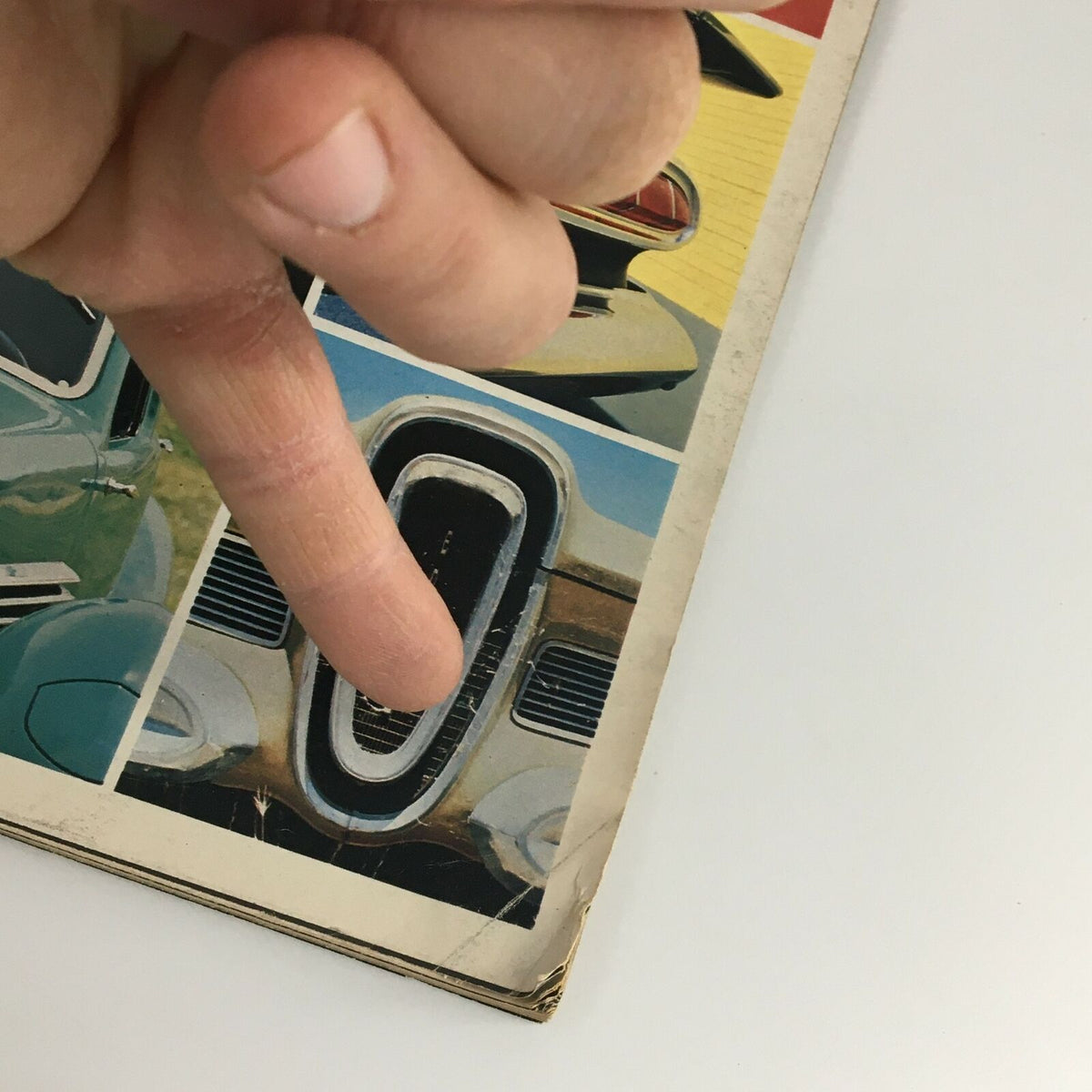 Close-up detail of the VTG Life Magazine September 1983 cover showcasing American cars with a finger pointing to a specific vehicle feature, highlighting the article on the 10 Best & Worst American Cars.