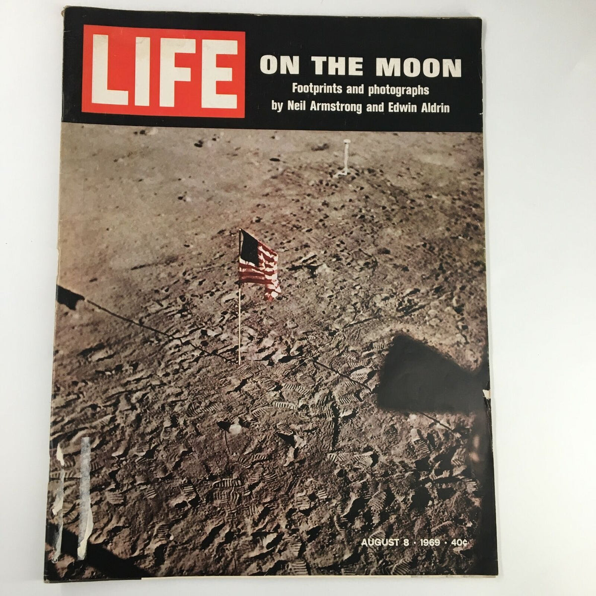Cover of VTG Life Magazine August 8 1969 featuring Neil Armstrong and Edwin Aldrin on the Moon, with an image of the lunar surface and an American flag.