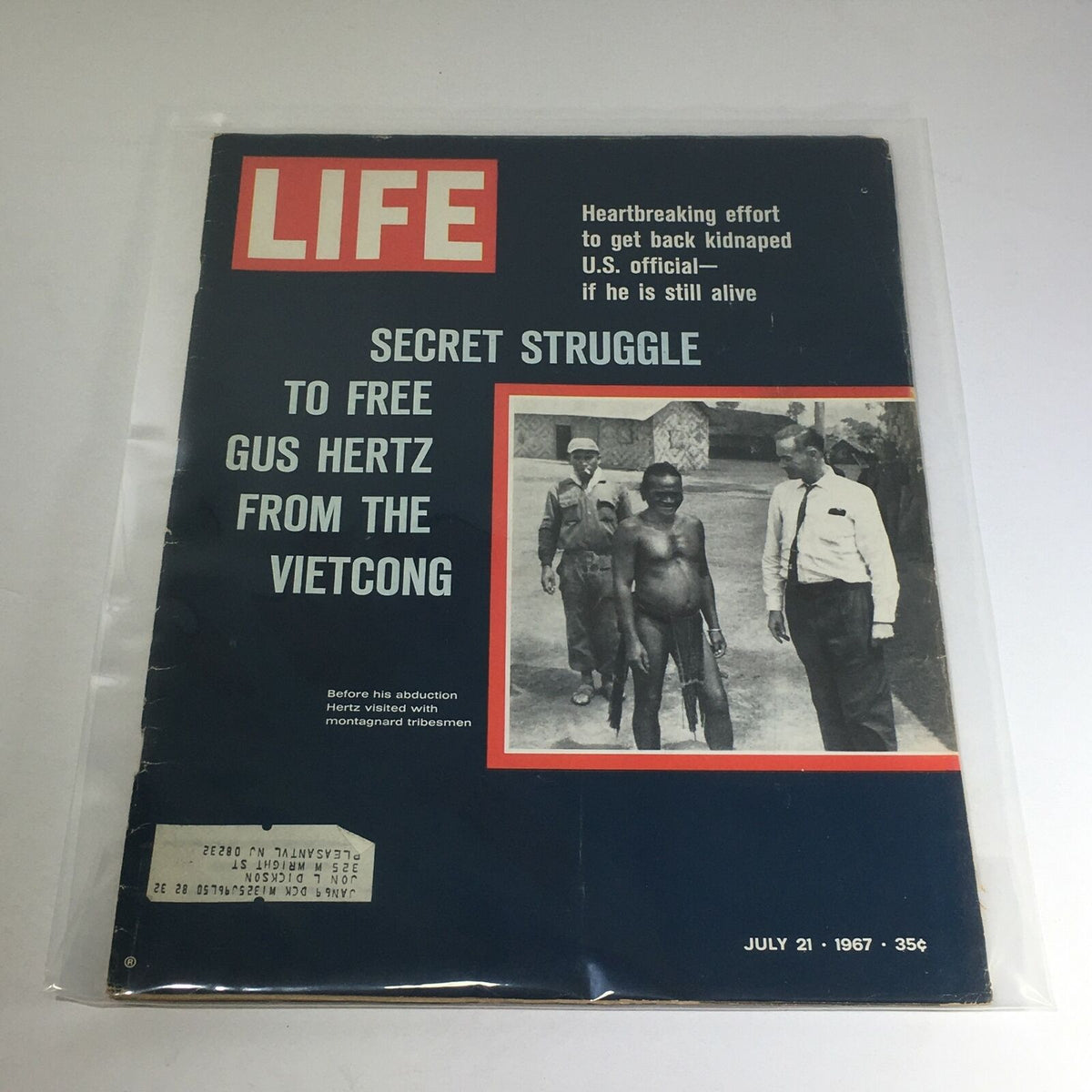 Cover of VTG Life Magazine from July 21, 1967, featuring the headline "Secret Struggle to Free Gus Hertz from the Vietcong". The image includes a historical photograph related to Hertz's visit to Montagnard Tribe before his abduction, showcasing the intriguing narrative within.