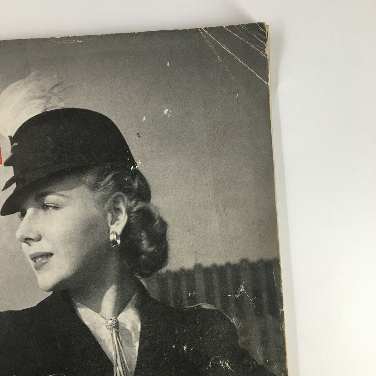 Close-up of the VTG Life Magazine October 23 1939 Cover, highlighting the stylish vintage attire of a woman wearing a hat, emblematic of late 1930s fashion.