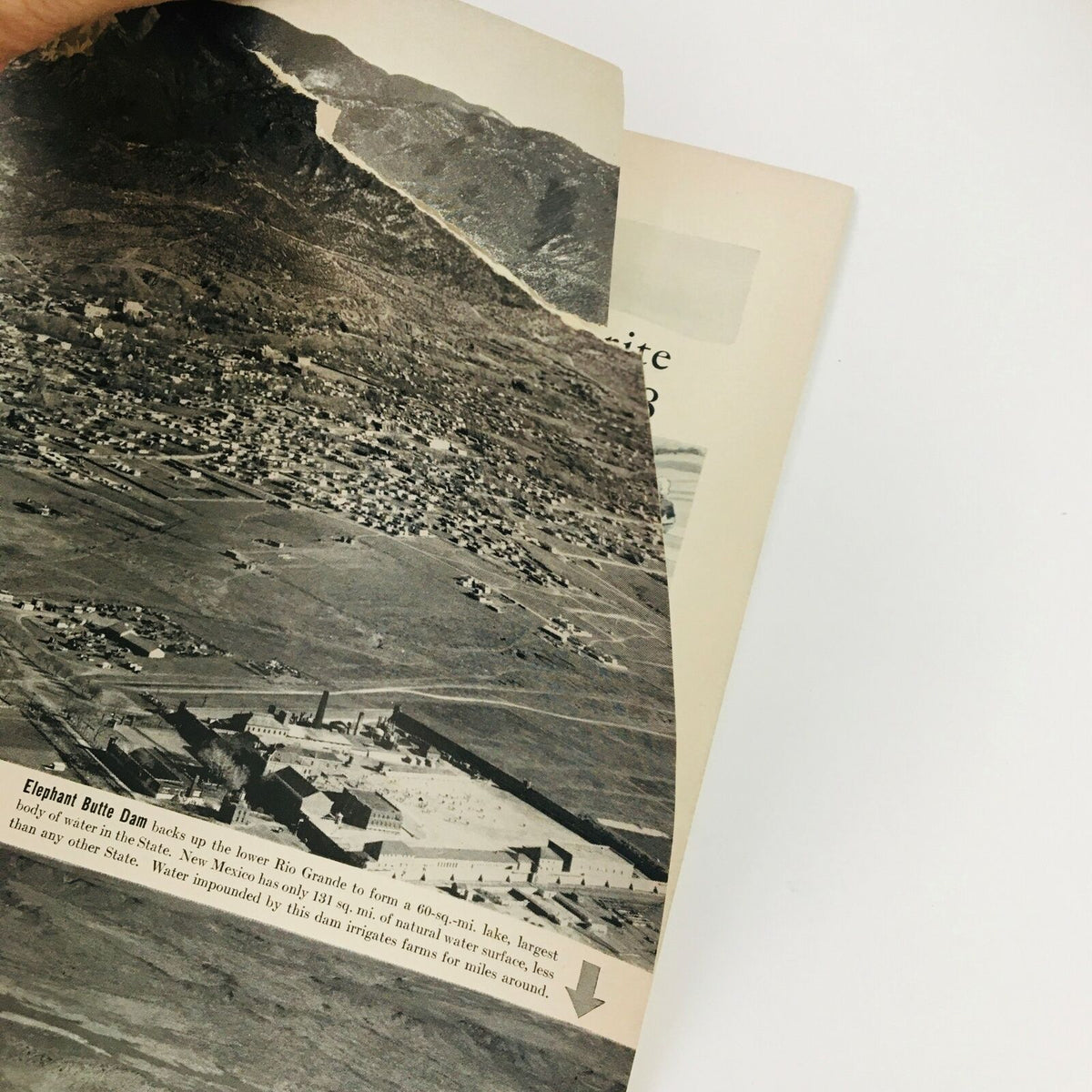 Page from VTG Life Magazine May 13 1940 featuring Elephant Butte Dam, showcasing an aerial photograph of the dam surrounded by landscape.