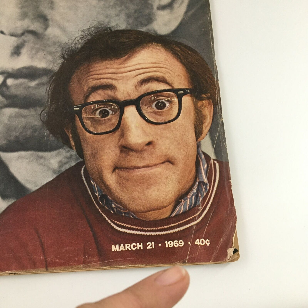 Close-up detail of the cover of VTG Life Magazine dated March 21, 1969, displaying Woody Allen's expression and the publication date, emphasizing its vintage appeal.