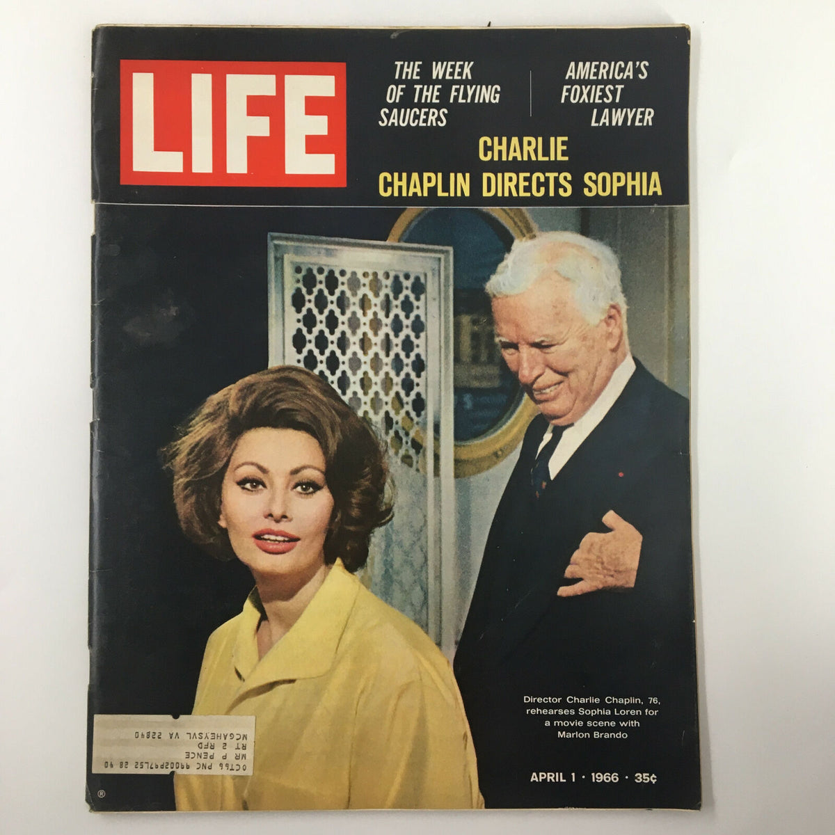 VTG Life Magazine April 1 1966 featuring director Charlie Chaplin with actress Sophia Loren on the cover. The magazine highlights a scene where Chaplin is rehearsing Loren for a movie scene.