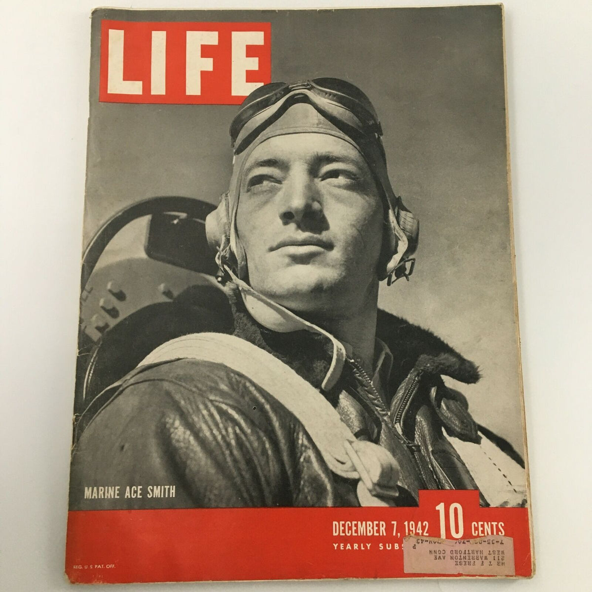 VTG Life Magazine December 7 1942 Marine Ace Smith Cover featuring a black and white image of Marine Ace Smith in aviation gear, showcasing a historic piece of World War II memorabilia.