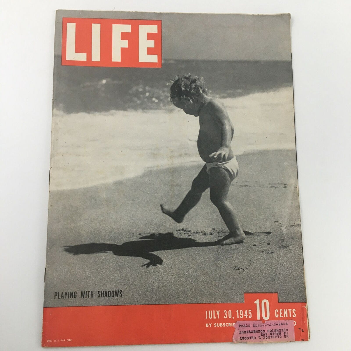 Cover of VTG Life Magazine July 30 1945 featuring a child playing on the beach titled 'Playing With Shadows On The Shore.' The magazine highlights the post-World War II era.