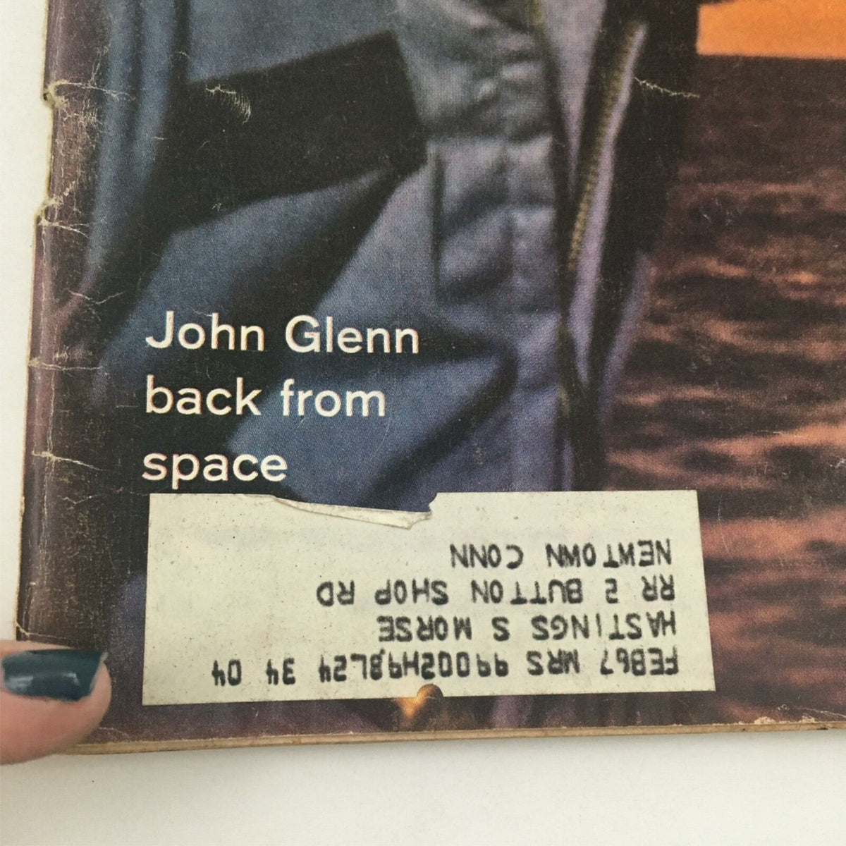 Detail of the VTG Life Magazine March 2, 1962 cover showing the text 'John Glenn back from space'. This close-up captures the magazine's vintage appeal and highlights Glenn's historic achievements.