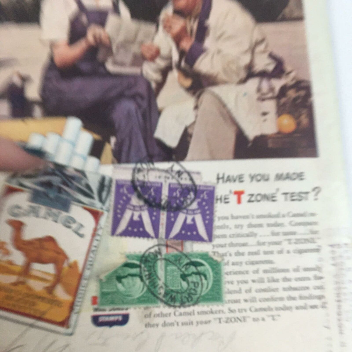 Close-up of an advertisement from the VTG Life Magazine November 15, 1943, featuring Camel cigarettes with iconic branding and vintage postage stamps, emphasizing historical marketing techniques.