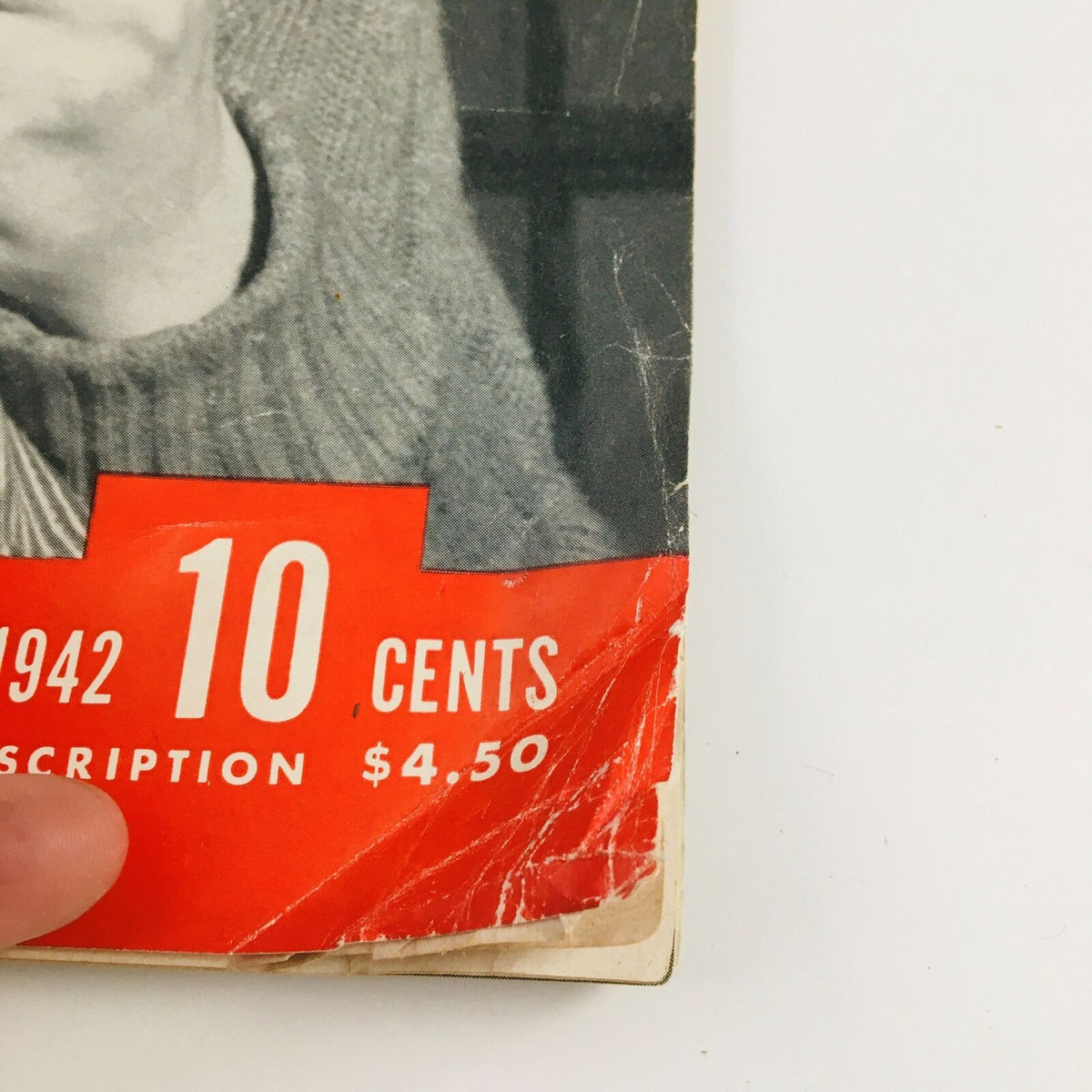 Cover detail of VTG Life Magazine March 23, 1942 featuring a vibrant red background with the price '10 Cents' and a subscription cost of '$4.50' suggesting its vintage status.