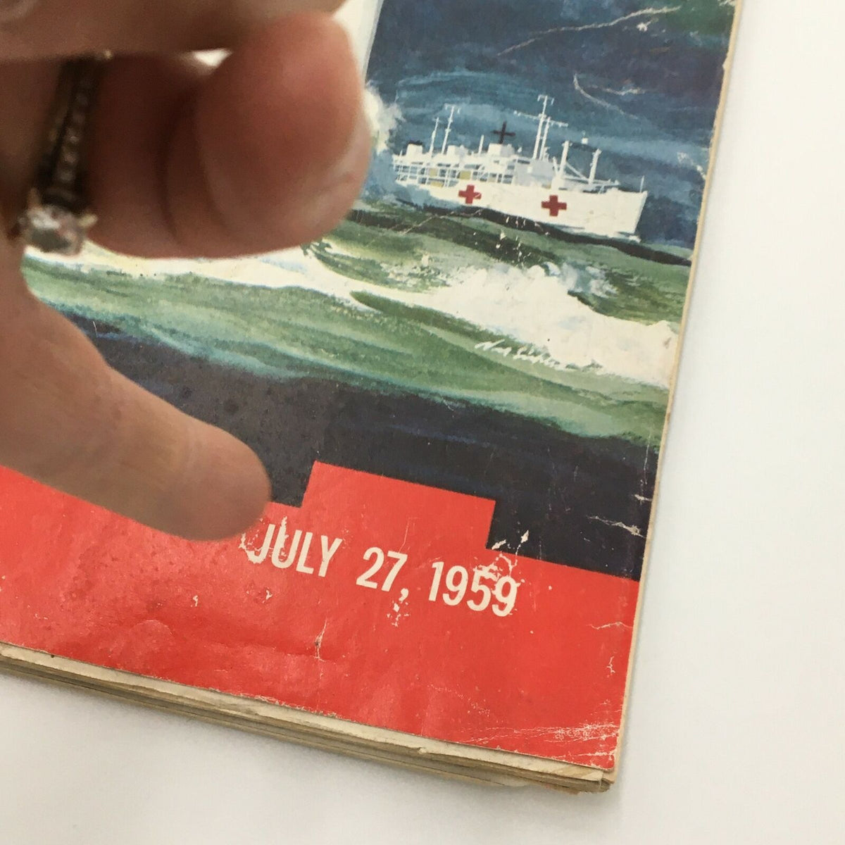 Detail of the bottom section of the VTG Life Magazine July 27 1959 cover showcasing the publication date and a depiction of medical ships.