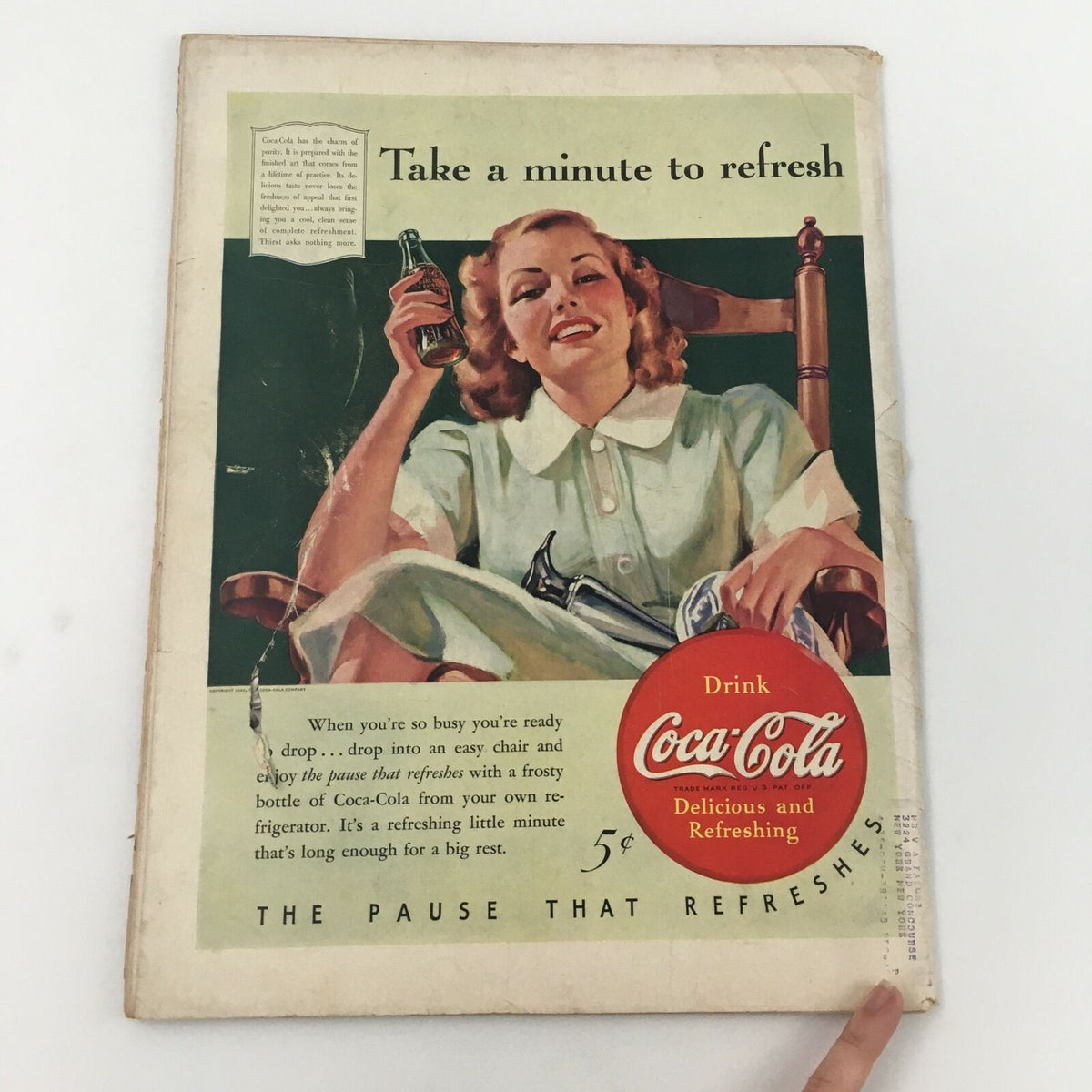 Back cover of VTG Life Magazine, April 8, 1940, depicting a vintage Coca-Cola advertisement with a smiling woman enjoying a drink, highlighting 1940s advertising style.