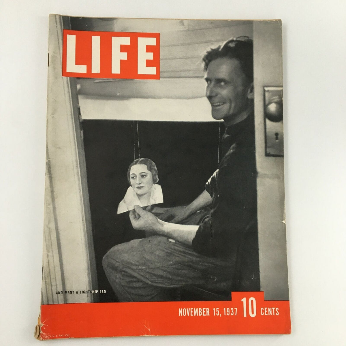 Cover of VTG Life Magazine from November 15, 1937 featuring a unique image related to Republican Navy themes alongside a smiling man. This vintage magazine captures historical essence and political themes of its era.
