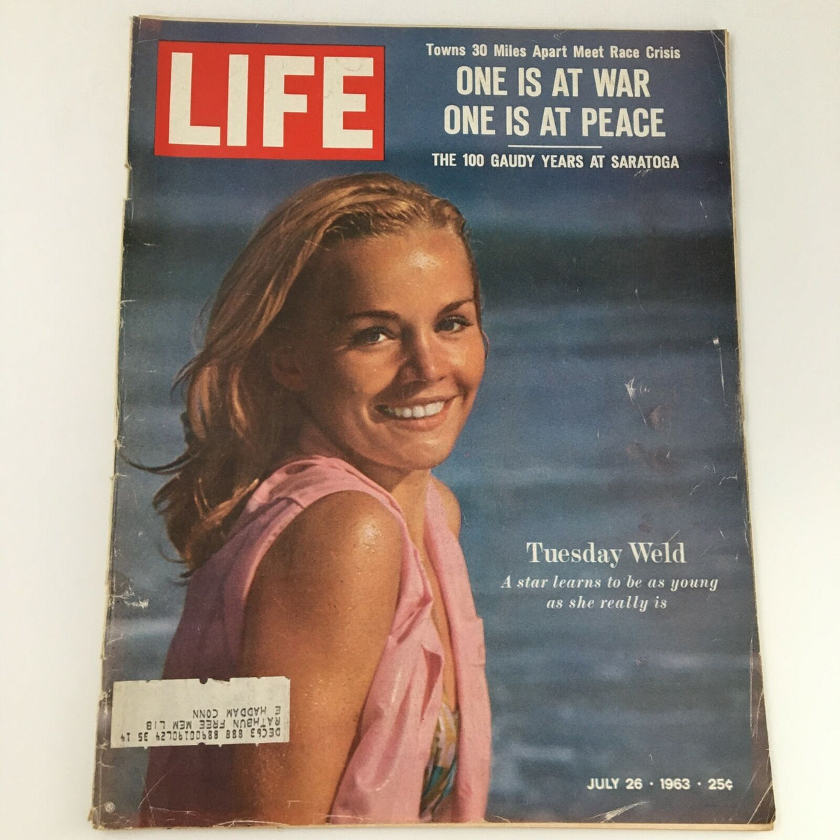 Cover of VTG Life Magazine July 26 1963 featuring American actress Tuesday Weld, showcasing her youthful beauty by the water.