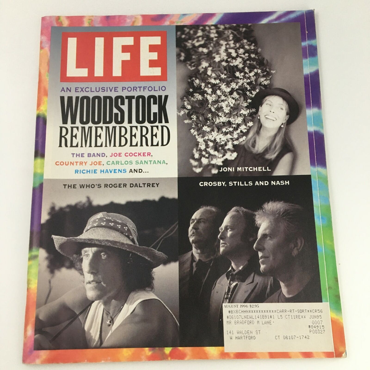 Cover of Life Magazine August 1994 titled 'Life Magazine August 1994 Exclusive Portfolio Woodstock Remembered Joni Mitchell' featuring Joni Mitchell, images of musicians and a colorful psychedelic border.