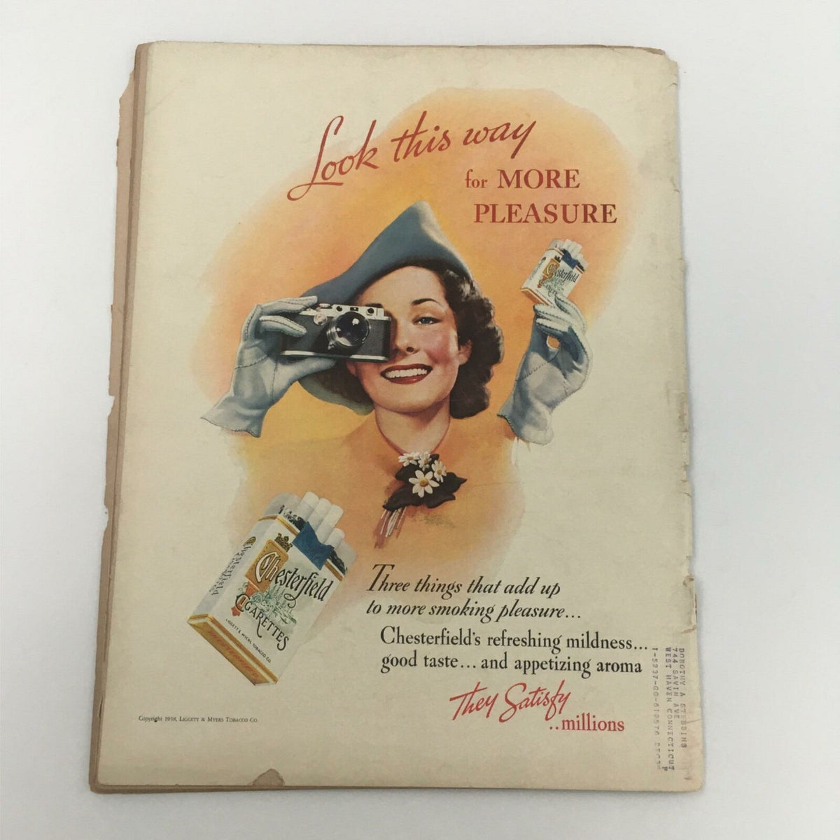 Back cover of VTG Life Magazine March 21, 1938, displaying an advertisement for Chesterfield cigarettes with a smiling woman taking a photo, promoting a nostalgic view of the era.