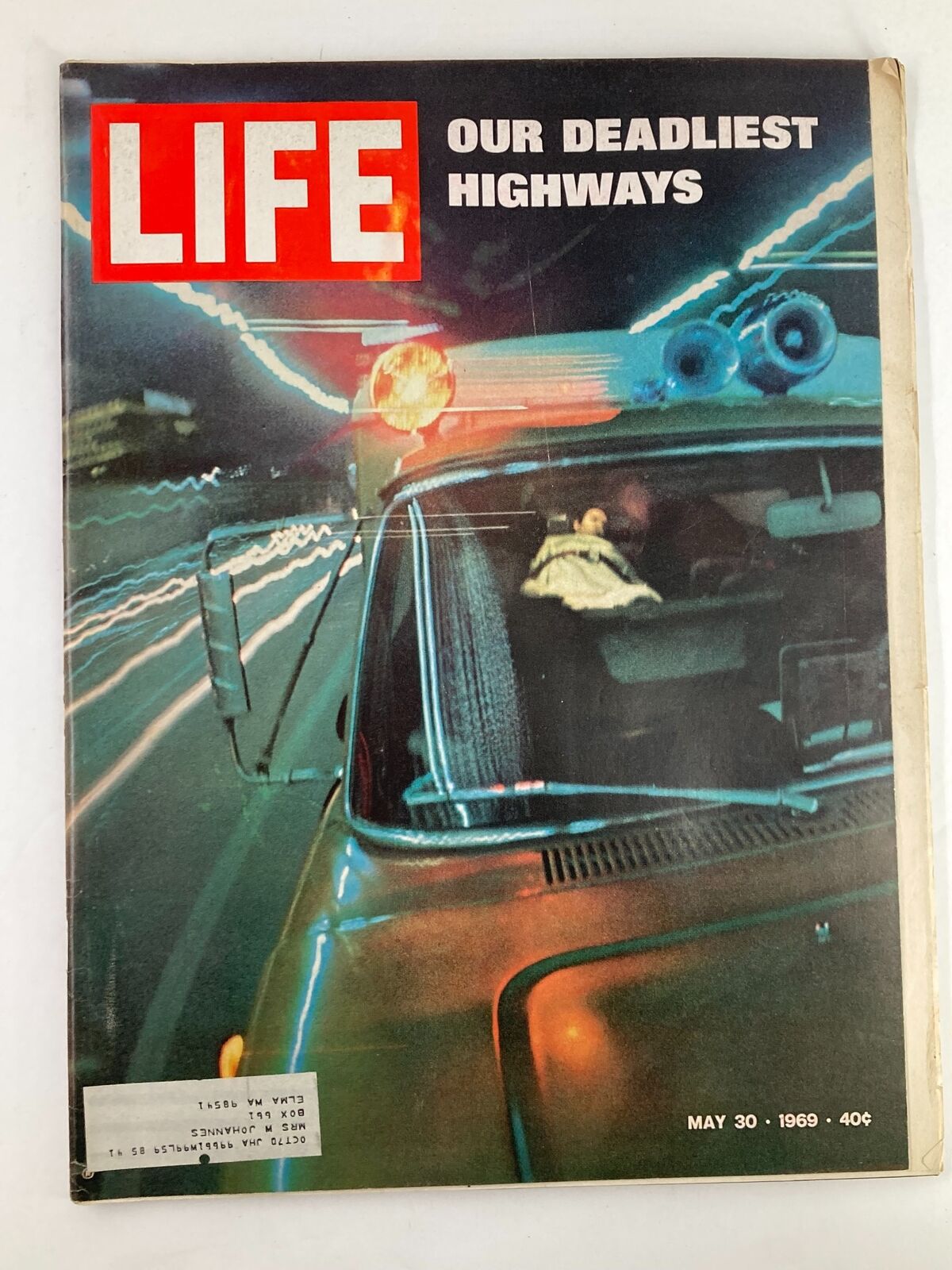 Cover of VTG Life Magazine from May 30, 1969, titled 'Our Deadliest Highways', featuring a vintage car with police lights, depicting the theme of highway safety and risks.