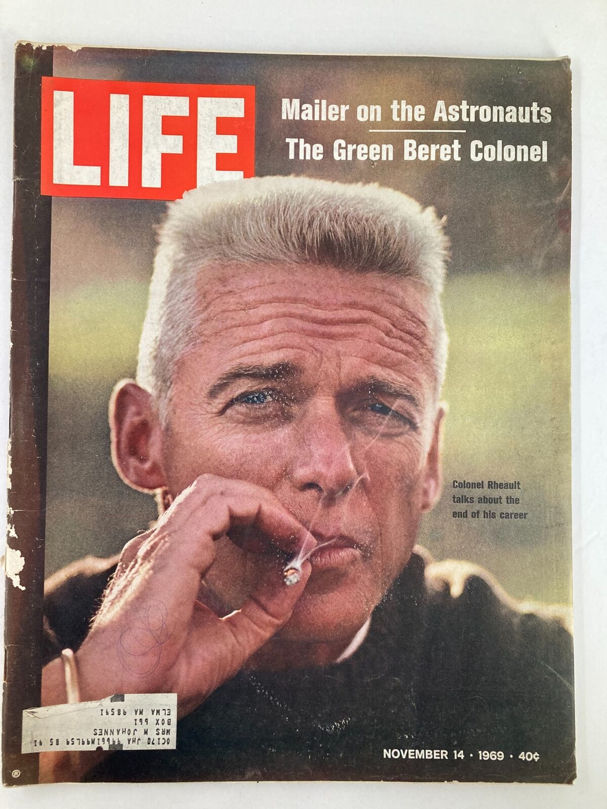 Cover of VTG Life Magazine from November 14, 1969 featuring Colonel Rheault, showcasing the end of his career with a compelling image of him smoking and reflecting on the military.
