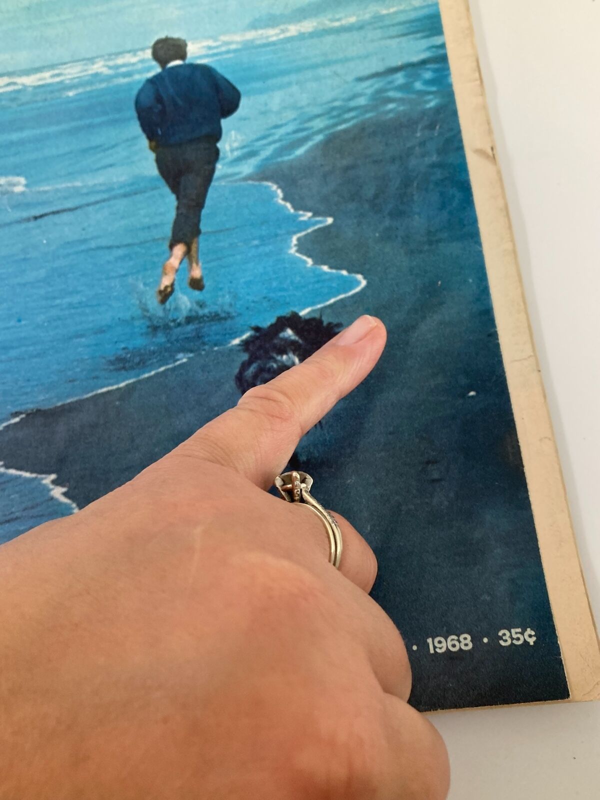 Close-up view of VTG Life Magazine June 14 1968 featuring Senator Robert F. Kennedy, depicting a person running by the shore with their foot in the water, highlighting the magazine's vintage character.