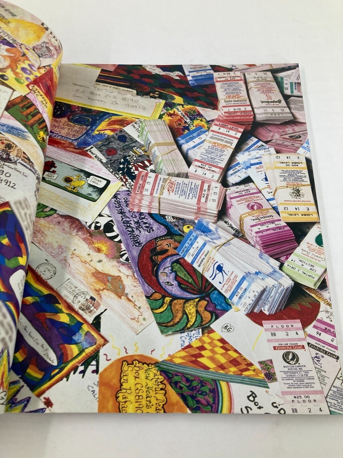 Inside page of the 2015 Life Magazine, 'The Grateful Dead: 50 Years Along The Golden Road', displaying a colorful collage of concert tickets and memorabilia.