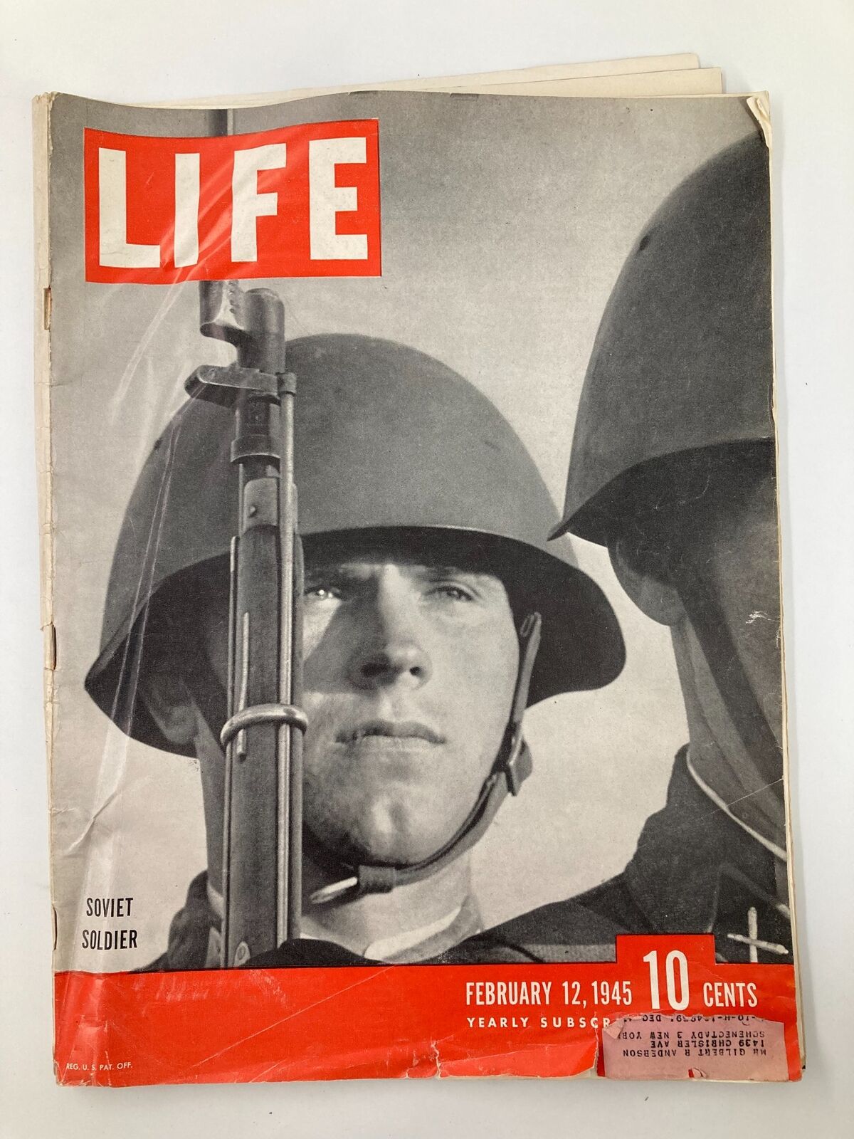 Cover of VTG Life Magazine February 12, 1945, featuring a photograph of a Soviet soldier, displaying bold red lettering and historical details relevant to World War II.