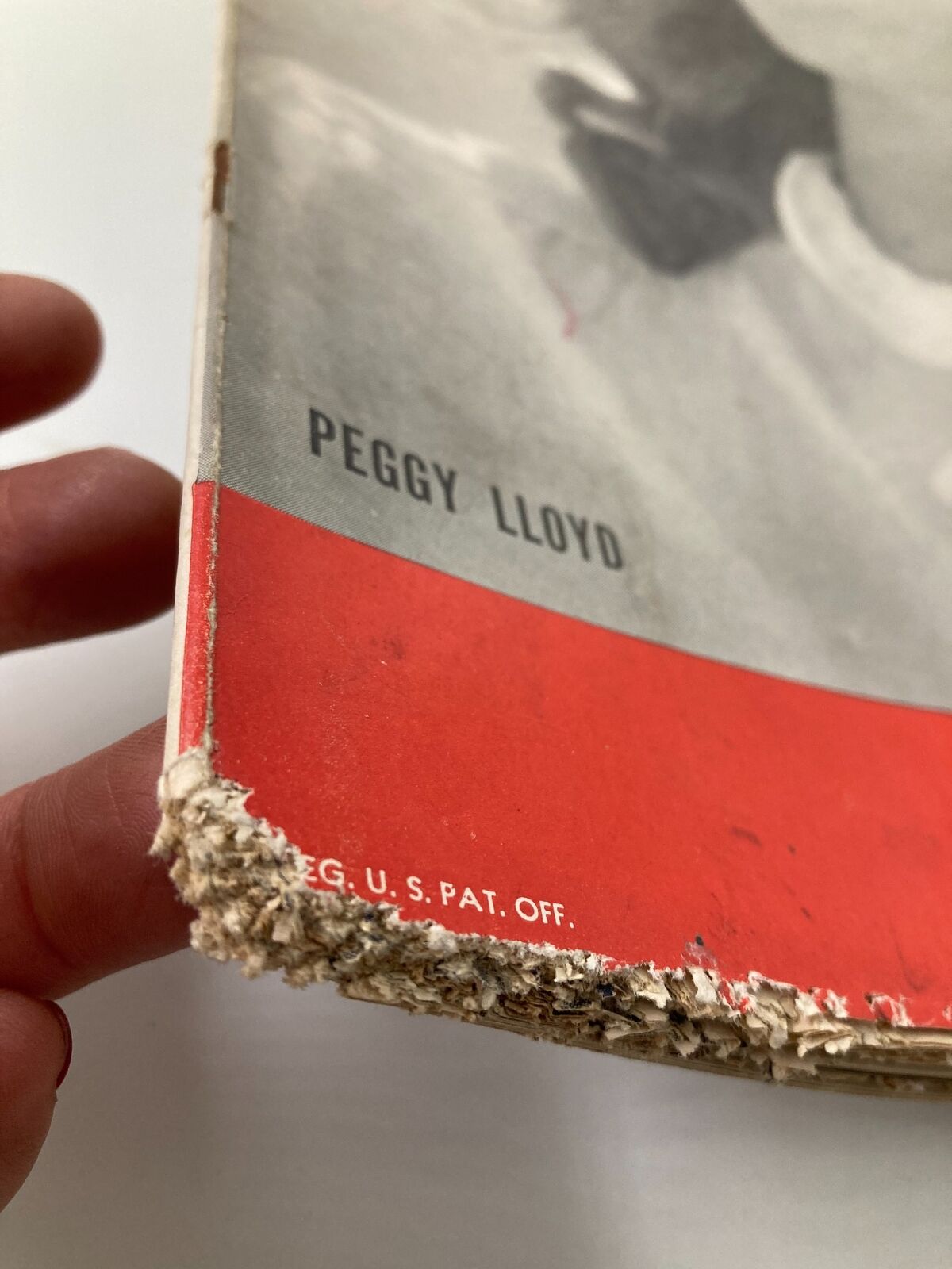 Detailed inspection of the spine and lower edge of VTG Life Magazine May 24 1943, revealing wear and vintage characteristics.