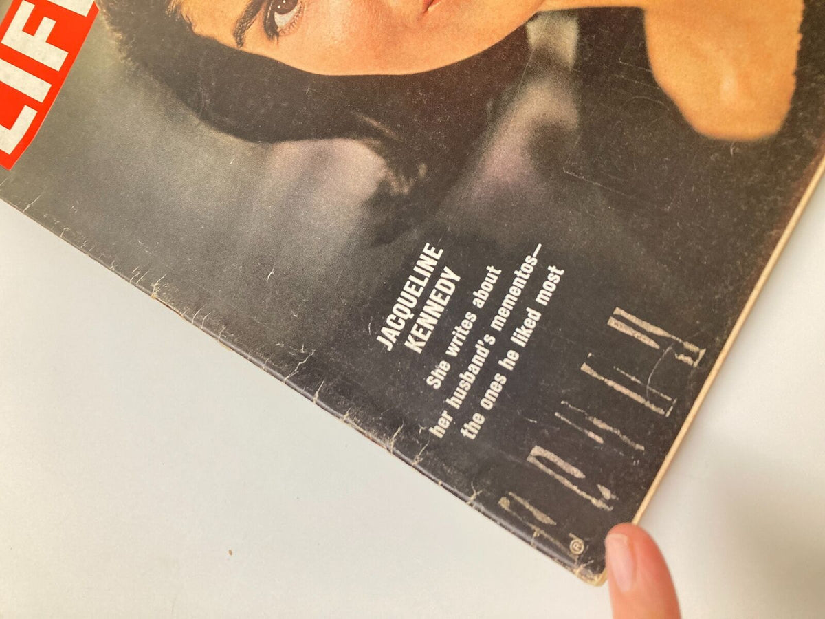 Close-up of the cover of VTG Life Magazine May 29 1964, featuring Jacqueline Kennedy, who writes about her husband's mementos, including details of wear on the magazine's edges.