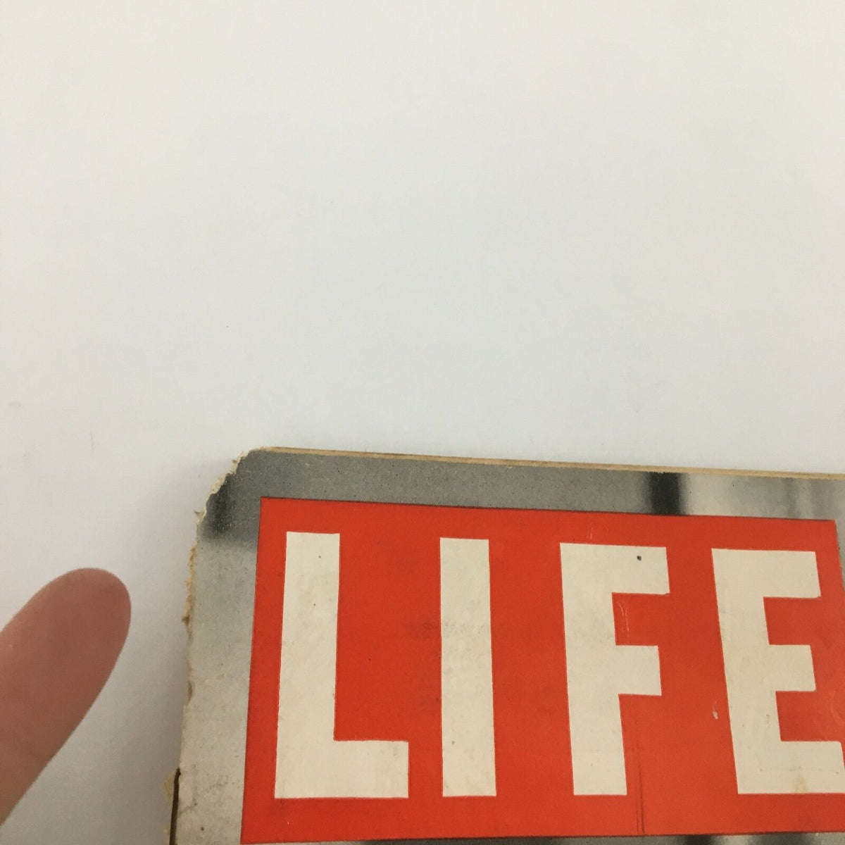 Close-up of the top edge of the VTG Life Magazine December 30, 1946, featuring visible wear and the prominent 'LIFE' logo.