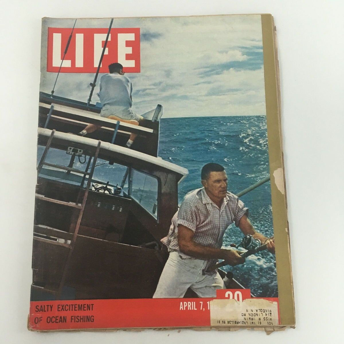 VTG Life Magazine April 7 1961 cover featuring ocean fishing theme with a fisherman on a boat, showcasing retro style and nostalgic vibes.