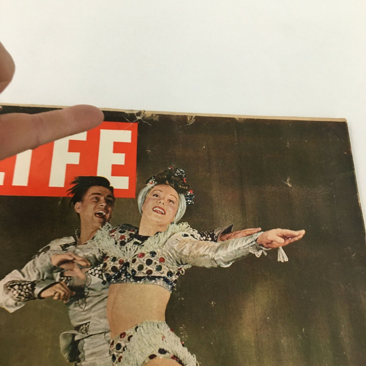 Close-up of the cover of VTG Life Magazine May 20, 1946 showcasing an ice show, highlighting details of the performers' costumes and expressions.