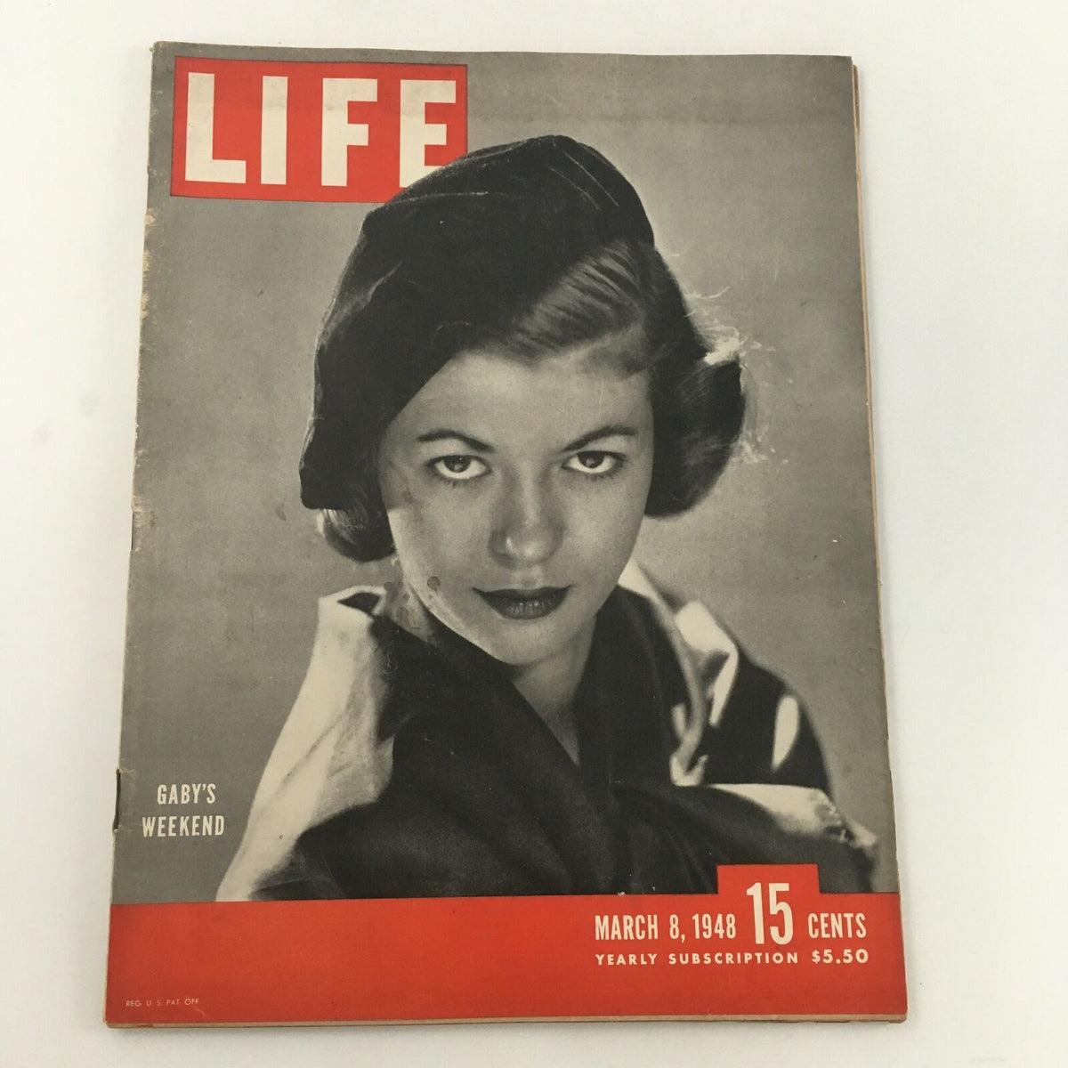 Cover of VTG Life Magazine March 8 1948 featuring model Gaby Bouche, showcasing her captivating expression and vintage hairstyle against a classic layout.