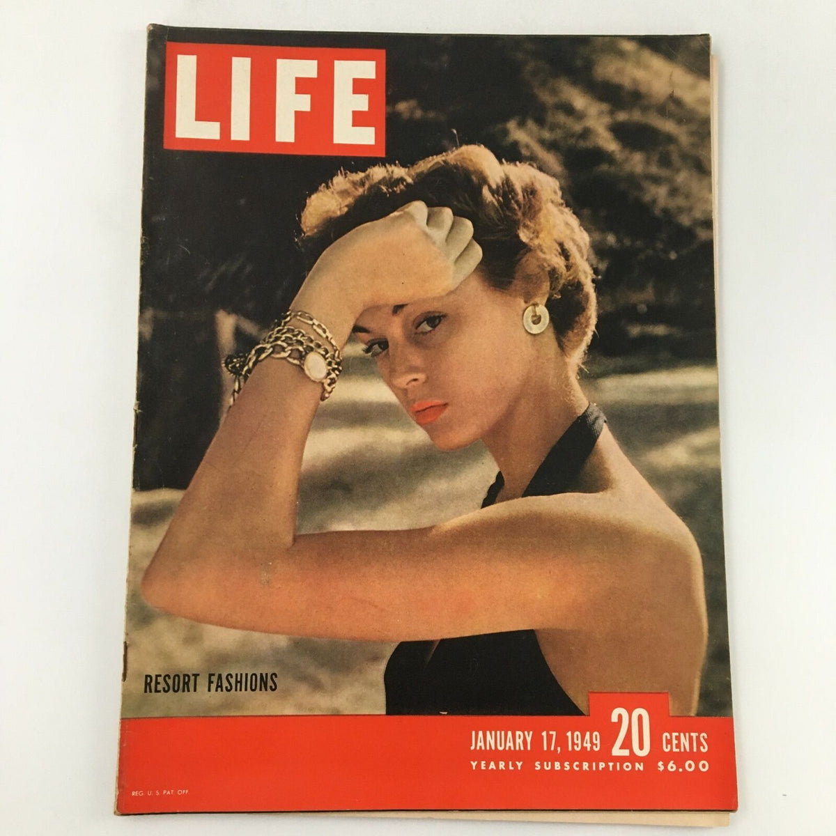 Cover of VTG Life Magazine from January 17, 1949 featuring resort fashions. The cover displays a woman posing with a stylish hairstyle, wearing a fashionable black outfit, highlighting mid-20th century style.