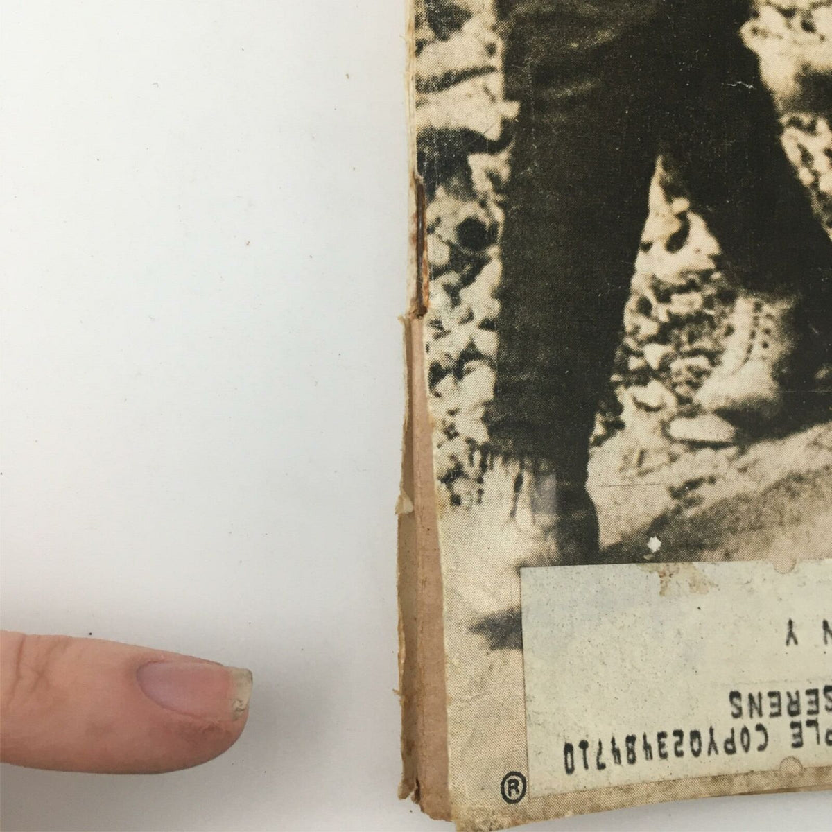 Detail of the spine of VTG Life Magazine March 13 1964, highlighting its used condition with minor wear and an address label, indicative of its history and collectible value.