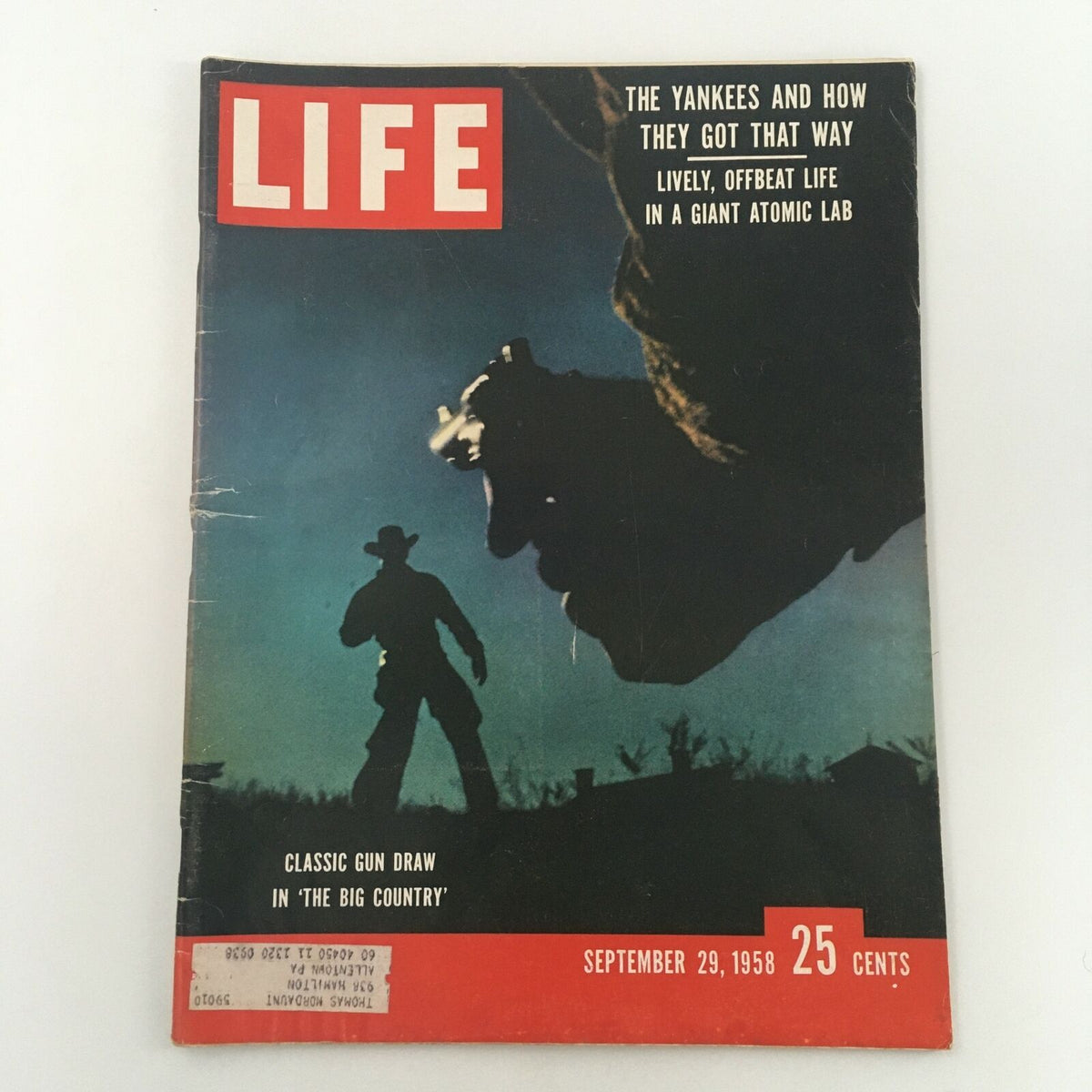 Cover of VTG Life Magazine September 29, 1958 showcasing a classic gun draw in 'The Big Country'. The image features a shadowy figure of a cowboy with a gun against a twilight backdrop, highlighting the nostalgic essence of mid-20th century Americana.