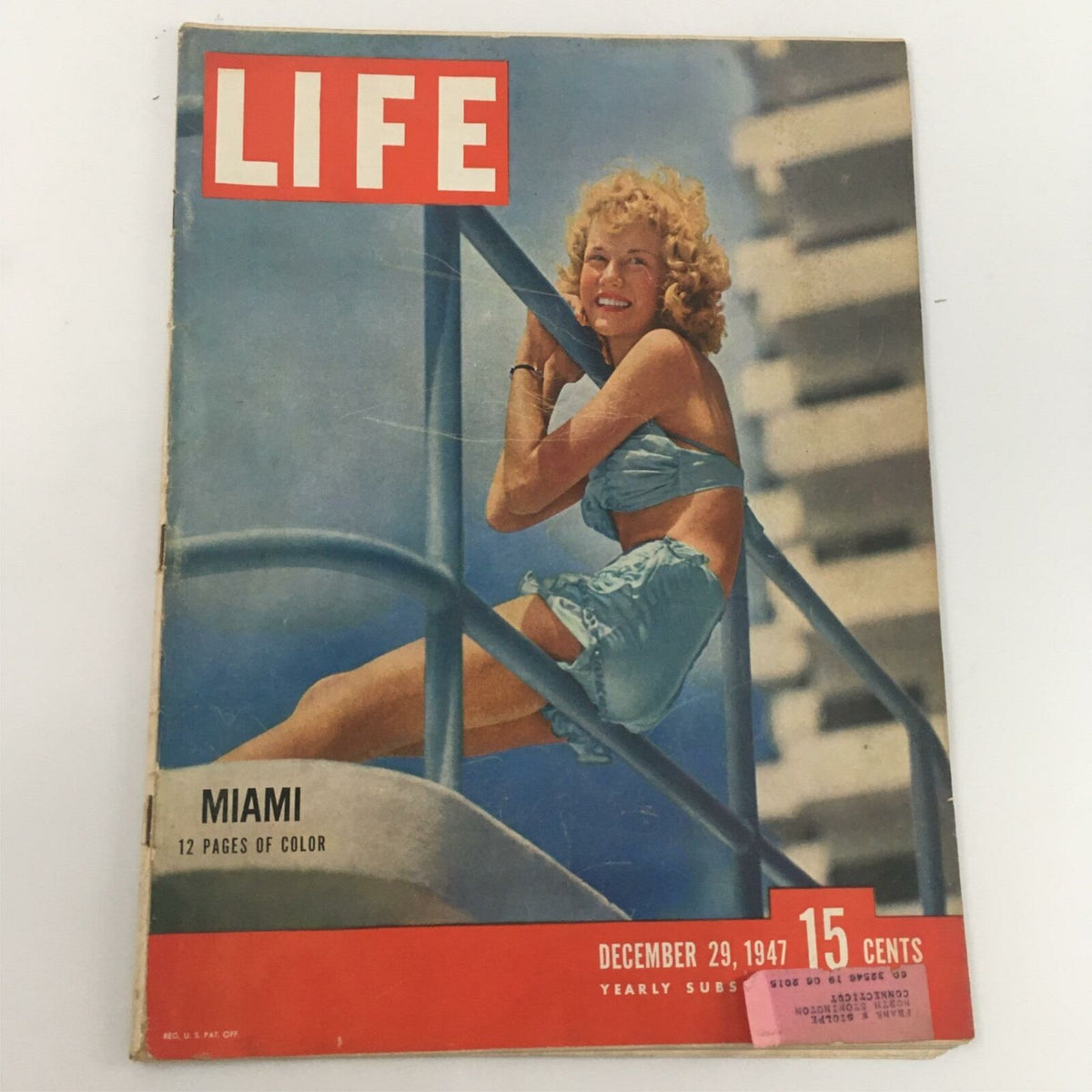 Cover of VTG Life Magazine December 19, 1947 featuring a cheerful woman in a light blue bathing suit against a vibrant Miami backdrop. The magazine boasts 12 pages of color showcasing Miami's post-war lifestyle, priced at 15 cents.