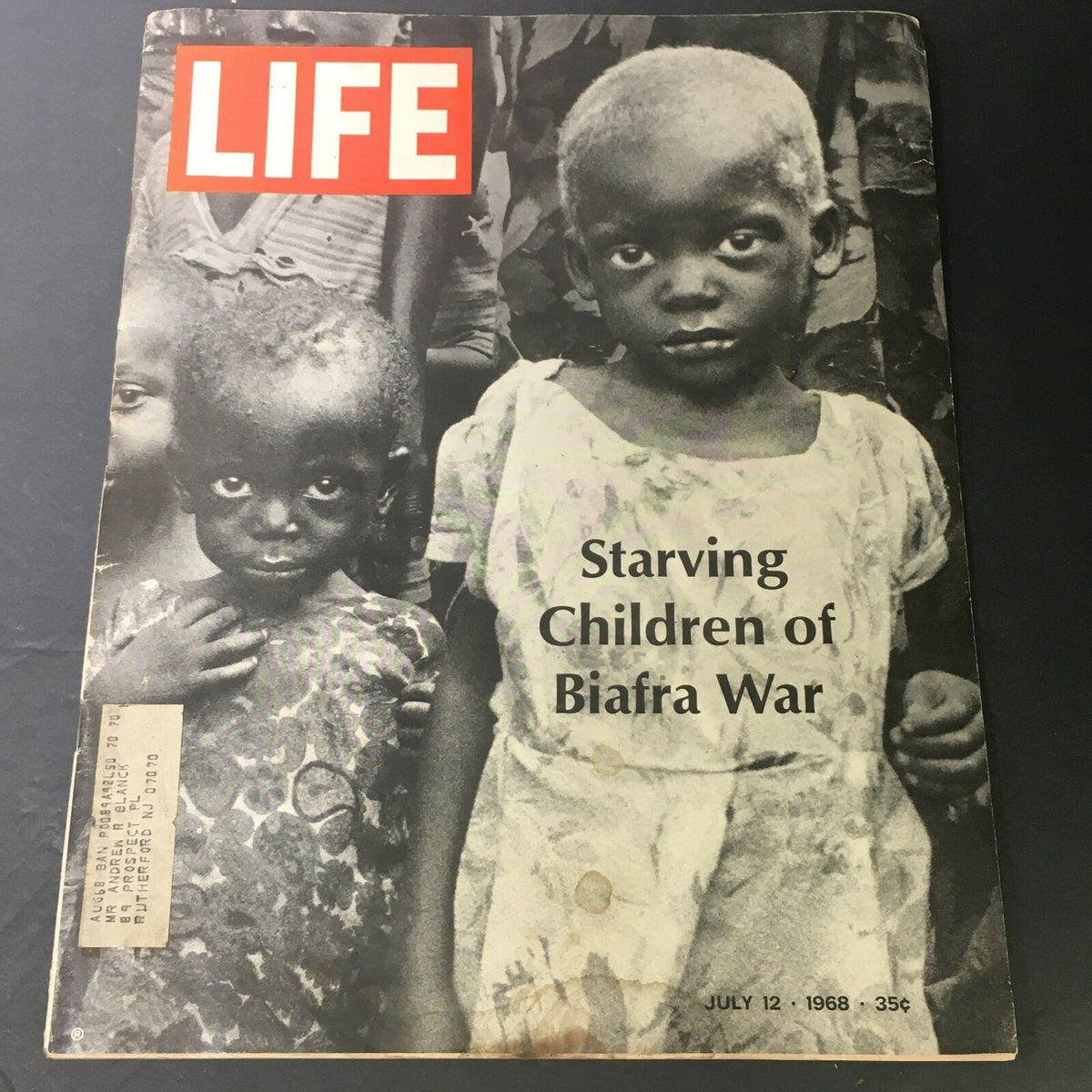 Cover of Vintage Life Magazine from July 12, 1968, featuring a poignant photograph of starving children during the Biafra War, highlighting the humanitarian crisis.