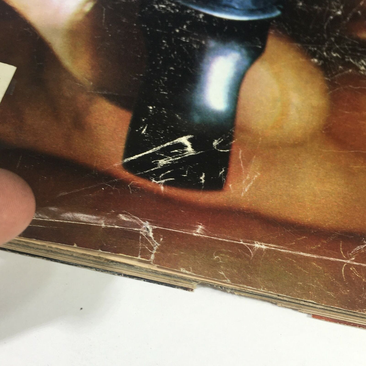 Close-up of the cover wear on VTG Life Magazine April 1982 featuring notable scratches and minor damage.