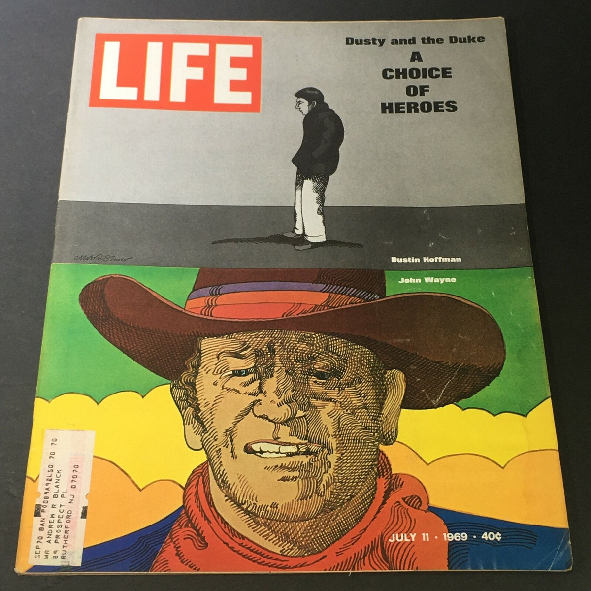 Cover of VTG Life Magazine from July 11, 1969 featuring Dustin Hoffman and John Wayne with the title 'A Choice of Heroes'.