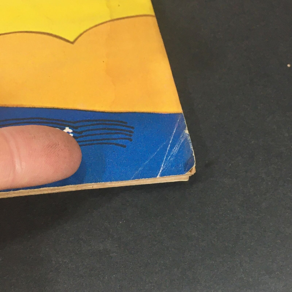 Detail view of the edge of the VTG Life Magazine July 11, 1969, showing minor damage and wear.